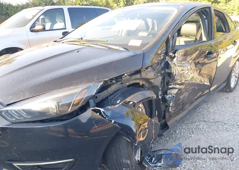 2016 Ford Focus Titanium из США, поврежденный, VIN 1FADP3J26GL280987